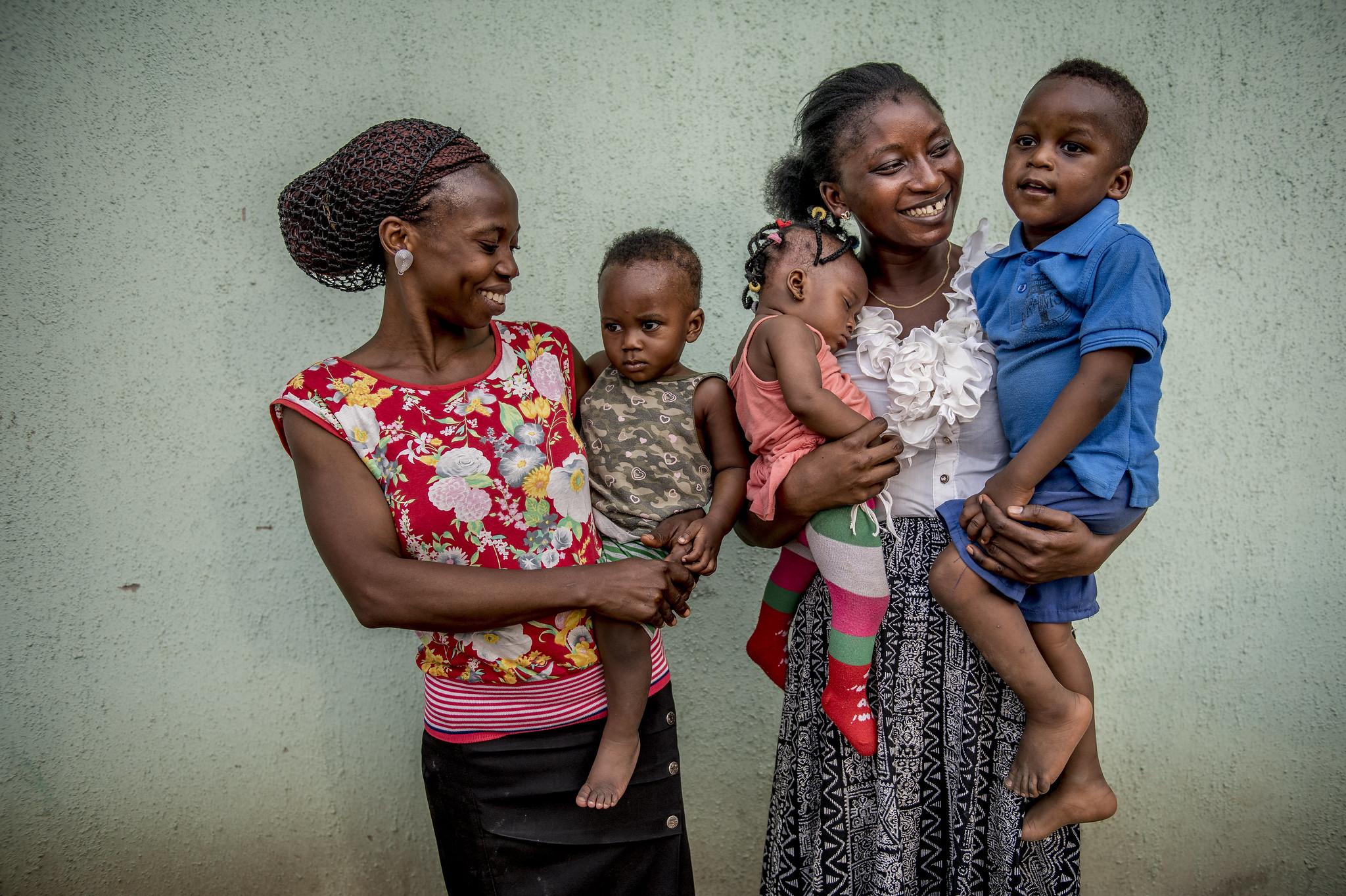 two women with two kids